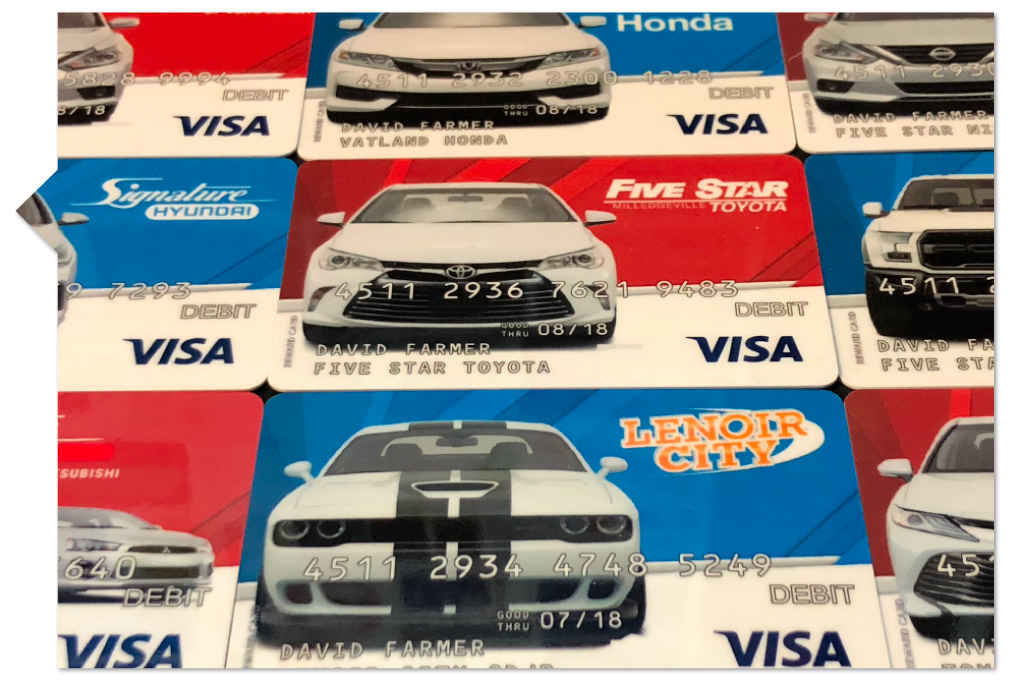 multiple Visa Gift cards with a Car on the front, used as an example for Visa Express Test Drive